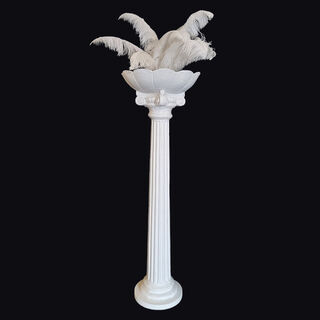 White Planter Column With White Feather Arrangement