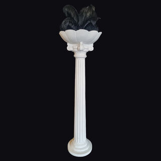 White Planter Column With Black Feather Arrangement